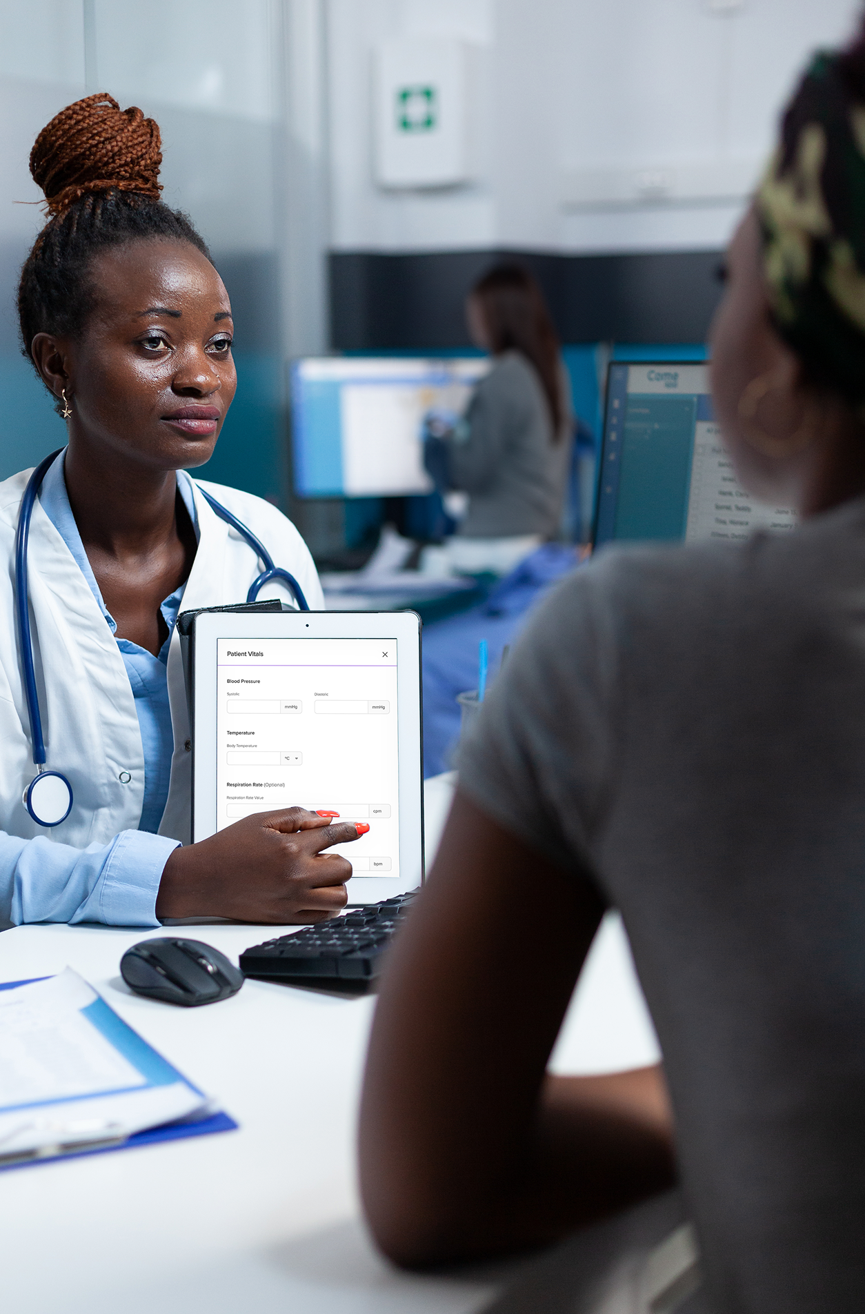 Doctor and patient during an in-person consultation